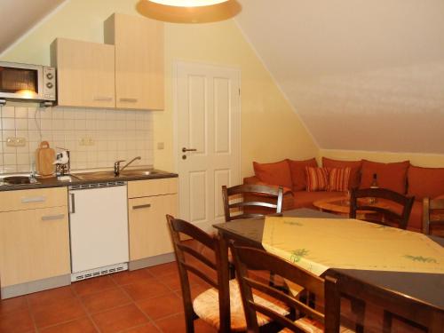 Kuchyň nebo kuchyňský kout v ubytování Ferienhaus Am Seeufer