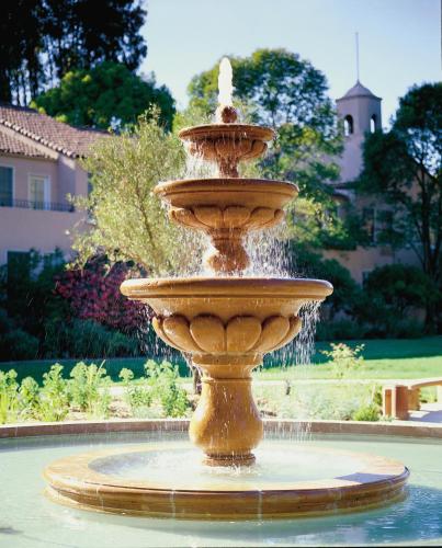 a fountain in the middle of a yard at Fairmont Sonoma Mission Inn & Spa in Sonoma