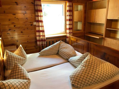 Кровать или кровати в номере Ferienhaus Stefania
