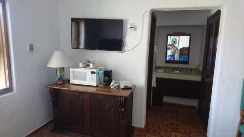 TV a/nebo společenská místnost v ubytování Villas del Sol en Los Tules