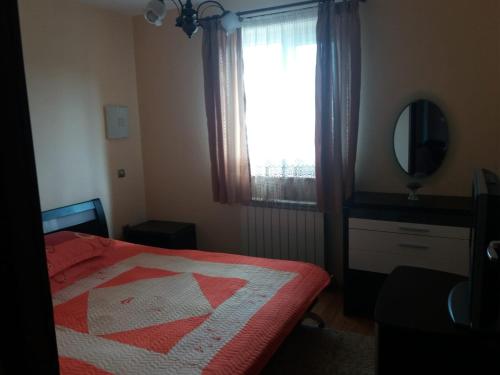 Postel nebo postele na pokoji v ubytování Apartament Alin