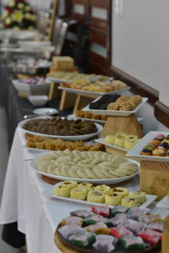 a buffet line of different types of cookies and pastries at Hotel Gabriella in Tagbilaran City