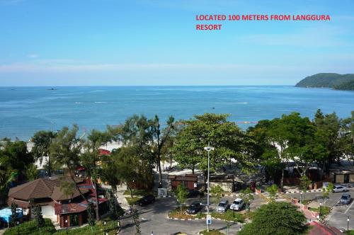 a view of the ocean from a resort at Langgura Baron Resort in Pantai Cenang