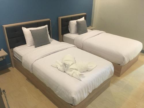 Postel nebo postele na pokoji v ubytování Zleep D Hotel