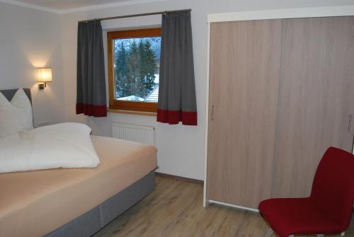 Кровать или кровати в номере Haus Miksch