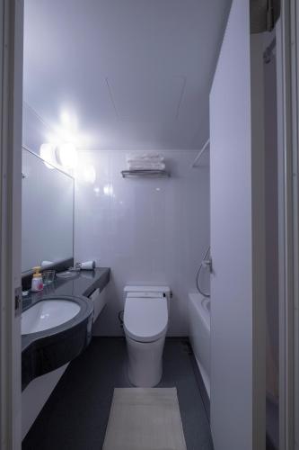 Ванная комната в Studio Inn Nishi Shinjuku
