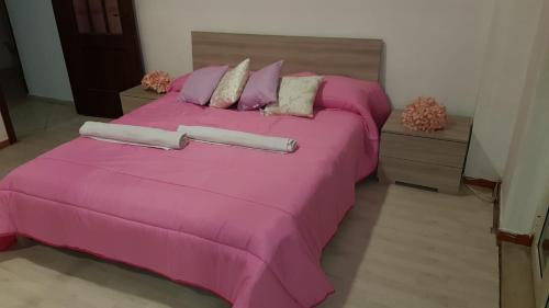 Ένα ή περισσότερα κρεβάτια σε δωμάτιο στο B&B Belvedere