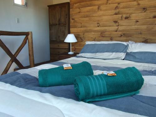 A bed or beds in a room at Cabaña Las hermanas