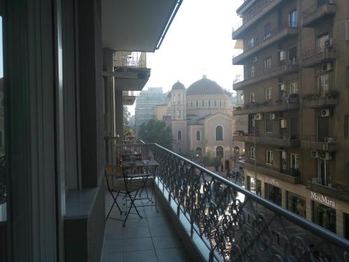 a balcony with a view of a building at Apartment in the city center in Thessaloniki