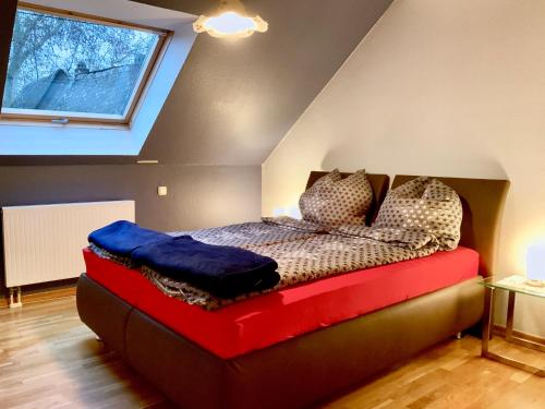 Postel nebo postele na pokoji v ubytování Ferienwohnung Om Maat