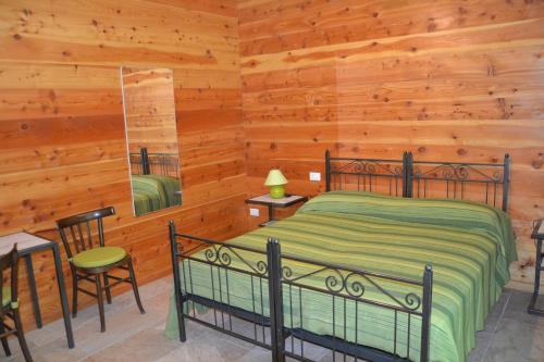Postel nebo postele na pokoji v ubytování B&B L'albero e le stelle