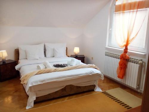 Postel nebo postele na pokoji v ubytování Apartment VILLA MERCI