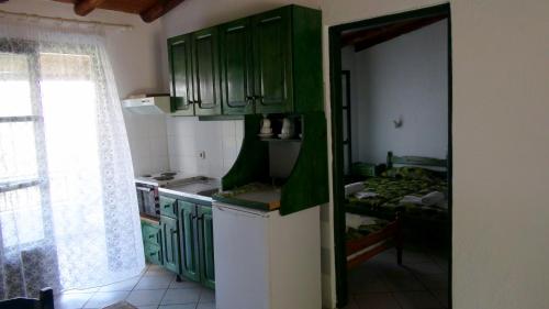Kuchyň nebo kuchyňský kout v ubytování Camelia studios Skiathos Town