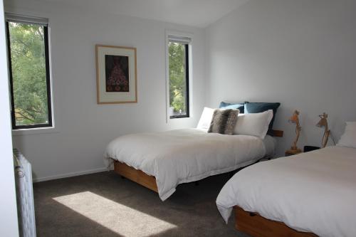 Säng eller sängar i ett rum på Korepo Lodge @ Ruby Bay