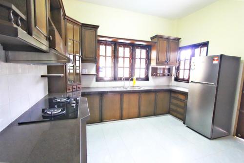 A kitchen or kitchenette at Gajah Villa 82