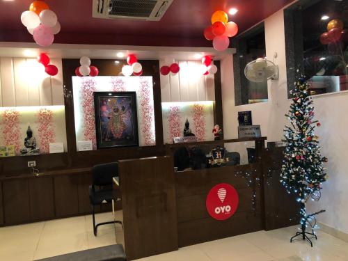 a christmas tree in the front of a restaurant at Hotel Rivera Palace in Varanasi