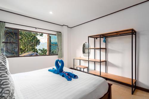 Кровать или кровати в номере Chaweng Lakeview Residence