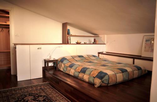 Postel nebo postele na pokoji v ubytování B&B Fiera - Mini attico