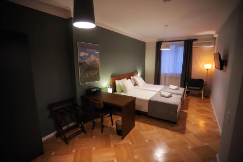 Postel nebo postele na pokoji v ubytování HOTEL SABU