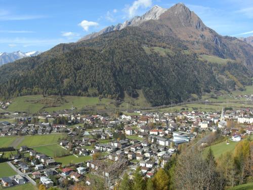 an aerial view of a small town in the mountains at Haus Trojer in Matrei in Osttirol