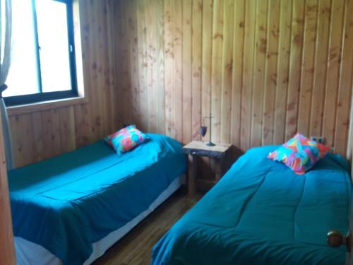 Krevet ili kreveti u jedinici u okviru objekta Arquería Patagonia Lodge