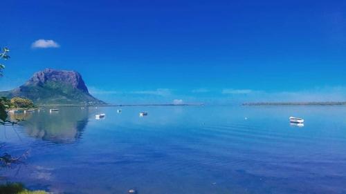 a large body of water with boats in it at Seaview Kite Studio - La Gaulette in La Gaulette