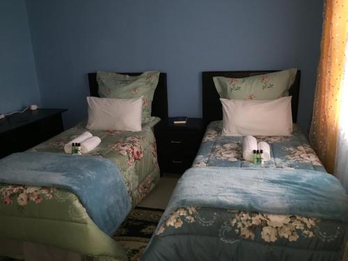 Ένα ή περισσότερα κρεβάτια σε δωμάτιο στο Rehoboth Family Guest House