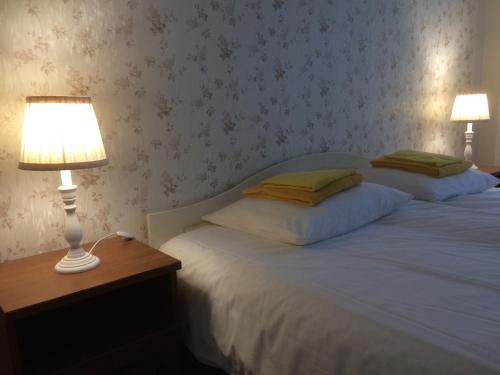 Postel nebo postele na pokoji v ubytování Nurmeveski Apartment