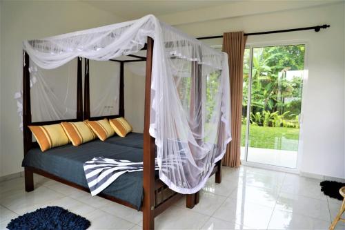 Foto da galeria de Villa Kaya Guest House em Hikkaduwa