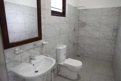 Ванная комната в Villa Kaya Guest House