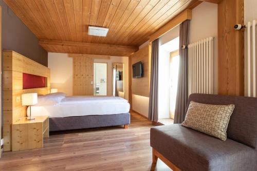 Postel nebo postele na pokoji v ubytování Meisser Lodge