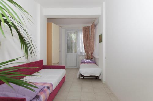 Posteľ alebo postele v izbe v ubytovaní Casa Lella