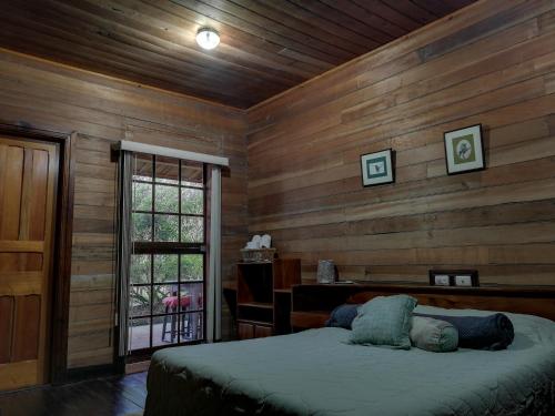 Una cama o camas en una habitación de Finca Queveri