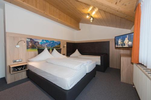 Cama o camas de una habitación en Appartements Schneezauber