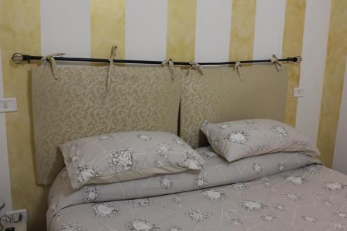 מיטה או מיטות בחדר ב-A57