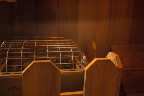 a bed in a room with two wooden posts at The Pollard Hotel in Red Lodge