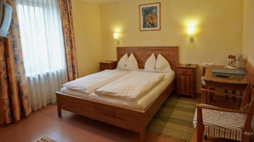 Cama o camas de una habitación en Itzlingerhof Rooms
