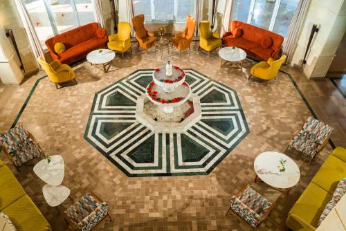 an overhead view of a lobby with a table and chairs at Thabraca Thalasso & Diving in Tabarka