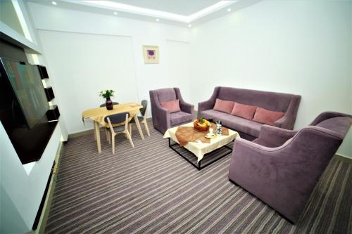 Zona de estar de Al Dyafa Hotel Suites