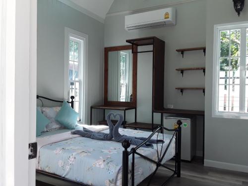 Postel nebo postele na pokoji v ubytování Sky cottage Bungalow
