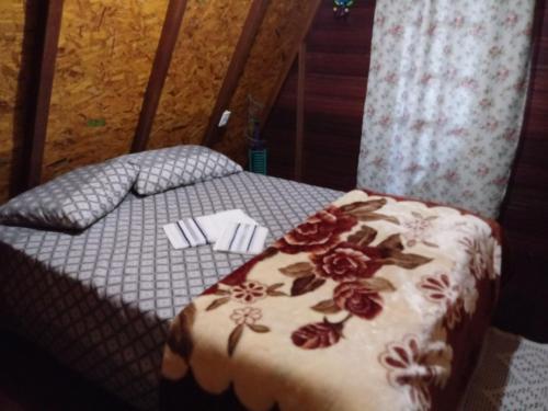 Postel nebo postele na pokoji v ubytování Recanto Mauá - Chalé Amor Perfeito