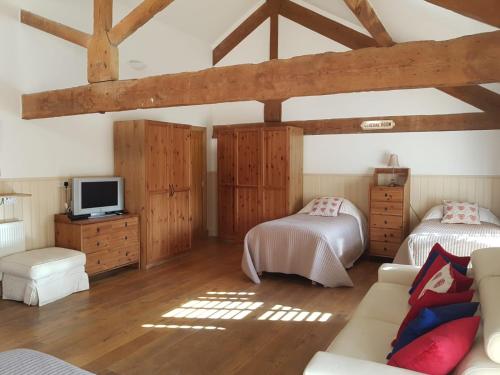 Voodi või voodid majutusasutuse The Old Granary Country-retreat toas