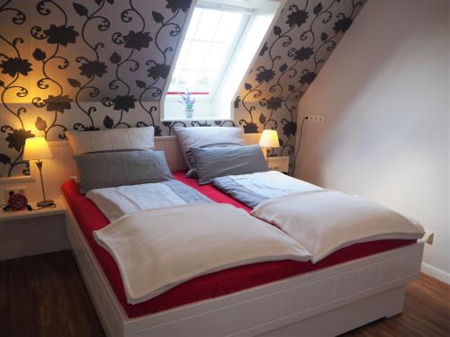 A bed or beds in a room at Suite in Nieblum - Martina Christiansen