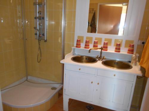 a bathroom with a sink and a shower at Ferienhaus Tillian in Hermagor