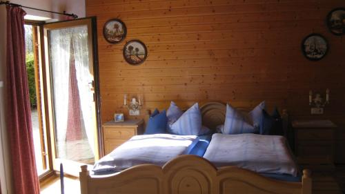 Postelja oz. postelje v sobi nastanitve Landhaus Wiesenhof Ferienwohnung Zugspitz