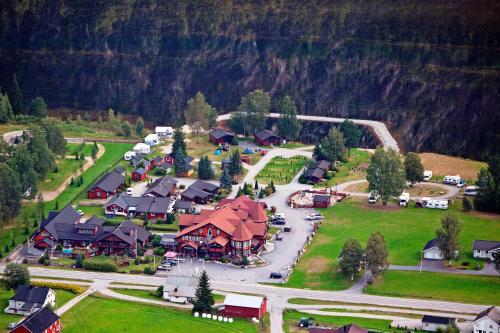 an aerial view of a small village with houses and cars at Sølvgarden Hotel in Rysstad