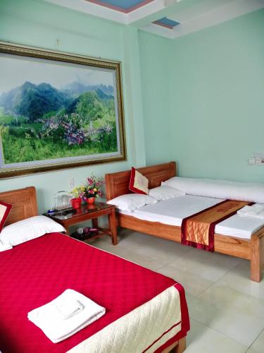 Postel nebo postele na pokoji v ubytování Yen Minh Hotel Thien An