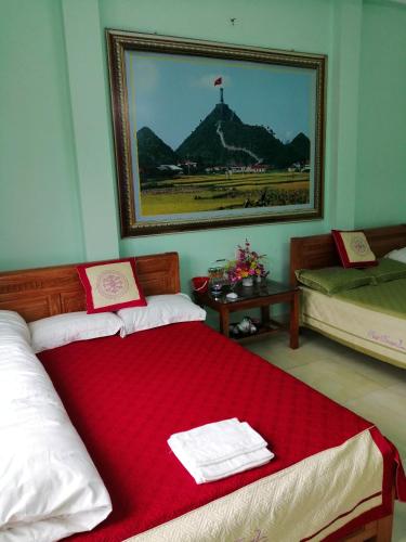 Postel nebo postele na pokoji v ubytování Yen Minh Hotel Thien An