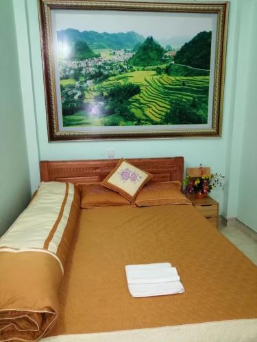 Postel nebo postele na pokoji v ubytování Yen Minh Hotel Thien An