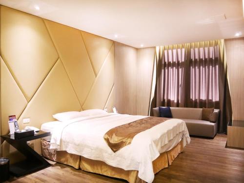 Cama o camas de una habitación en Refinement Motel